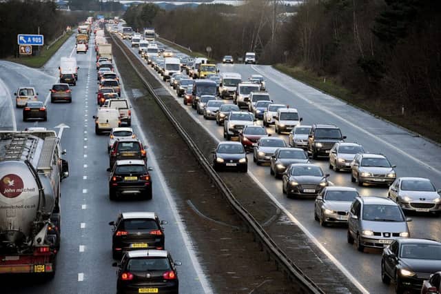 Ministers are planning a tax on car parking spaces to stop traffic levels increasing. Picture Michael Gillen