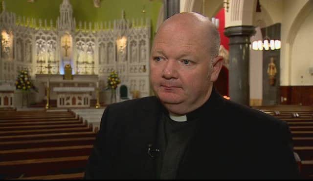 Father White was targeted outside St Alphonsus Church