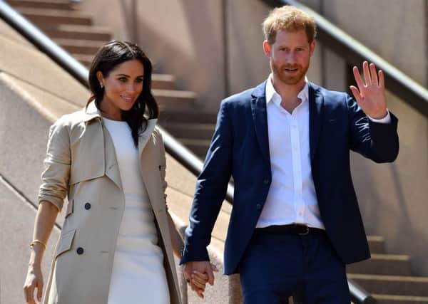 Britain's Prince Harry and his wife Meghan. Picture: Saeed Khan/AFP/Getty Images