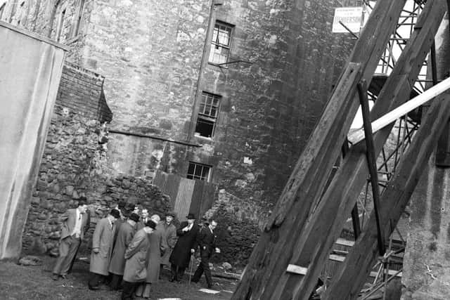 Tenements at Dalrymple Place and Beaumont Place being shored up after a tenement had collapsed.