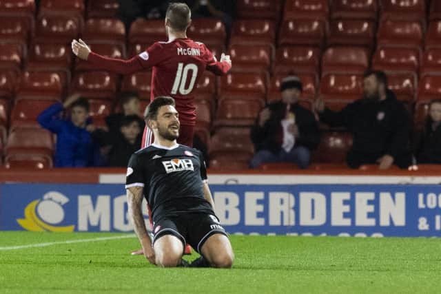 George Oakley celebrates grabbing the opener. Picture: SNS Group