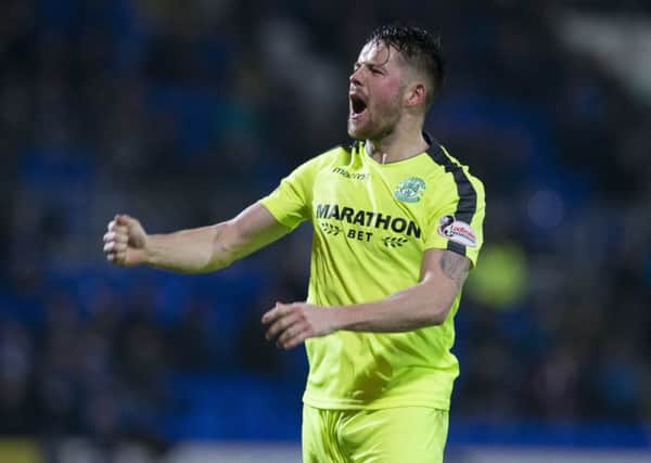 Marc McNulty roars his delight at grabbing a late winner. Picture: SNS Group