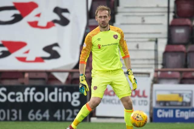 Hearts goalkeeper Zdenek Zlamal was nearly hit by what appeared to be a coin in the game against Celtic. Picture: SNS