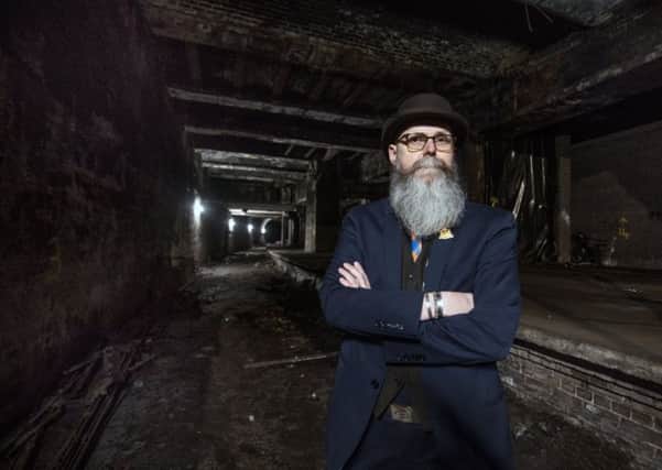 Tour guide Paul Lyons at the derelict underground platform at Glasgow Central. Picture: John Devlin