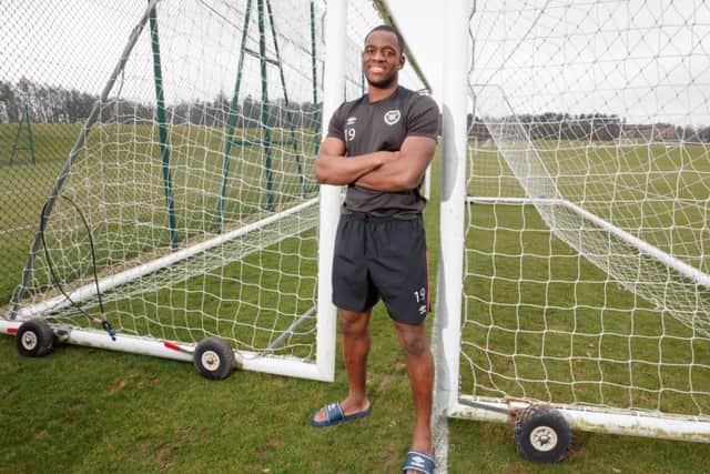 Giant striker Uche Ikpeazu takes too much punishment without being protected by referees says Hearts manager Craig Levein. Picture: SNS.