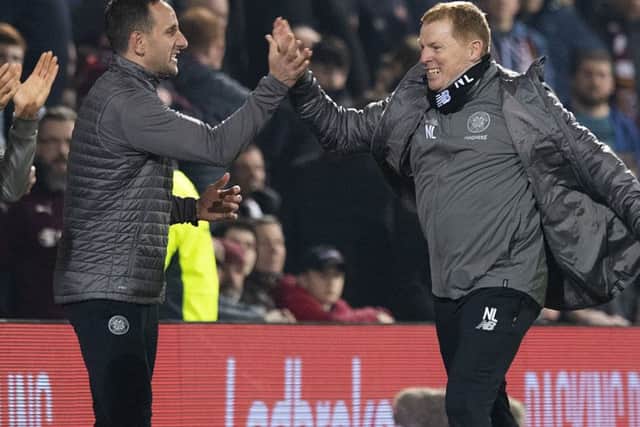 John Kennedy, left, and Neil Lennon celebrate beating Hearts. Picture: Craig Williamson/SNS
