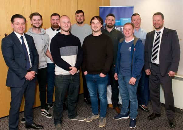 Ian Macfarlane (far left) pictured with CR Smith apprentices, and Frazer Walker, lecturer at Fife College (far right). Picture: Rebecca Lee Photography.