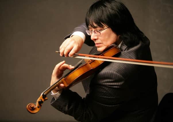 The Orchestras co-founder, Kazakh-born violinist Marat Bisengaliev