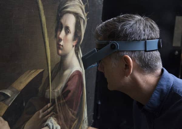 Larry Keith, head of conservation and keeper, examines the portrait, which was bought with the support of the American Friends of the National Gallery. Photograph: The National Gallery, London.