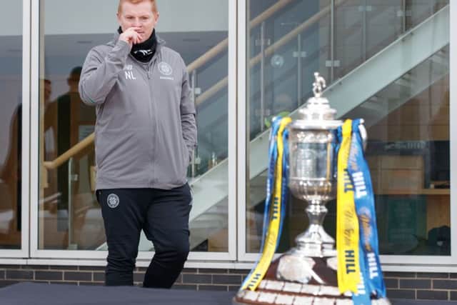 Neil Lennon keeps an on the Scottish Cup. Picture: Steve Welsh