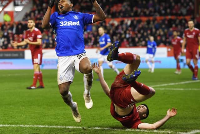 Alfredo Morelos and Scott McKenna were both dismissed following this clash at Pittodrie last month. Now they are set for a rematch. Picture: SNS.