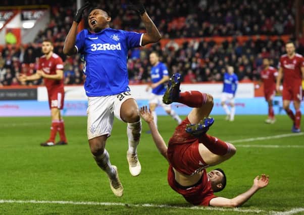 Alfredo Morelos and Scott McKenna were both dismissed following this clash at Pittodrie last month. Now they are set for a rematch. Picture: SNS.