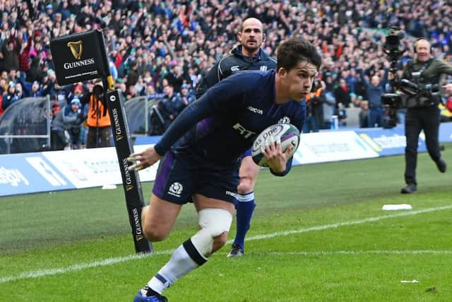 Scotland centre Sam Johnson scores against Ireland at Murrayfield. Picture: Andy Buchanan/AFP/Getty