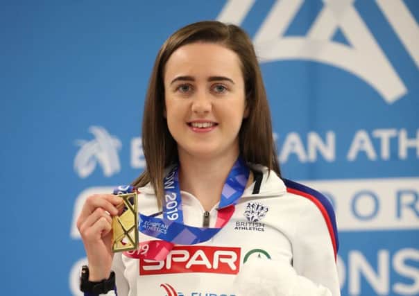 Great Britain's Laura Muir poses with her gold medal after winning the Women's 3000 metres. Pic: Jane Barlow/PA Wire