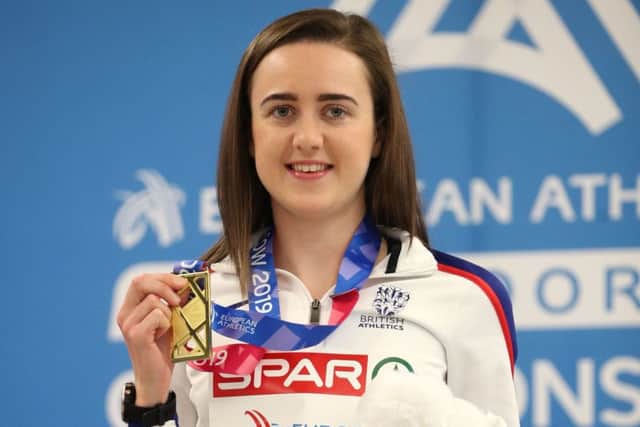 Great Britain's Laura Muir poses with her gold medal after winning the Women's 3000 metres. Pic: Jane Barlow/PA Wire