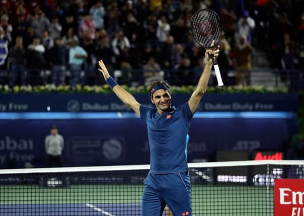 Roger Federer celebrates after winning the final match at the ATP Dubai Tennis Championship. Pic: Karim Sahib/AFPGetty Images