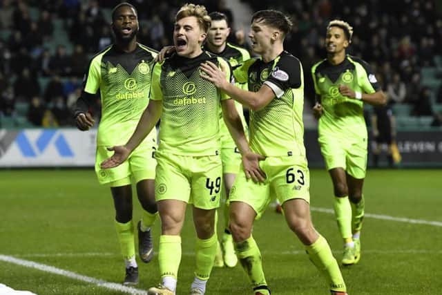 Celtic's James Forrest celebrates the opener. Pic: SNS/Rob Casey