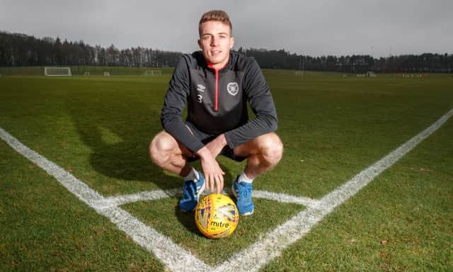 Conor Shaughnessy says he has learned a lot playing alongside Hearts captain Christophe Berra. Picture: Steve Welsh.