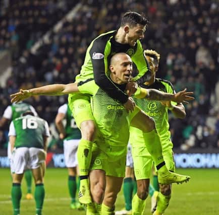 Scott Brown celebrates with Olly Burke after scoring on Saturday. Picture: SNS.