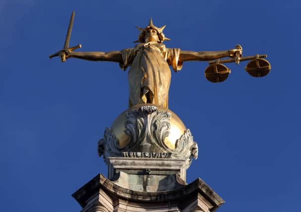 FW Pomeroy's Statue of Lady Justice in London. Nicola Stocker has won a libel case at London's High Court over Facebook posts made about her former husband. Picture: Jonathan Brady/PA Wire