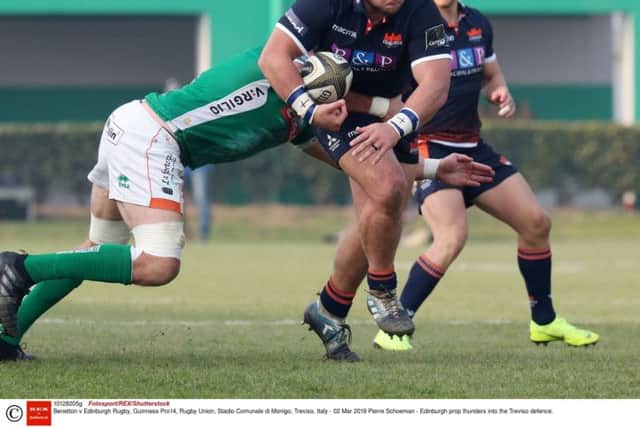 Edinburgh prop Pierre Schoeman  attmpts to burst through the Benetton defence during Saturdays defeat in Treviso. Picture: Fotosport/REX/Shutterstock