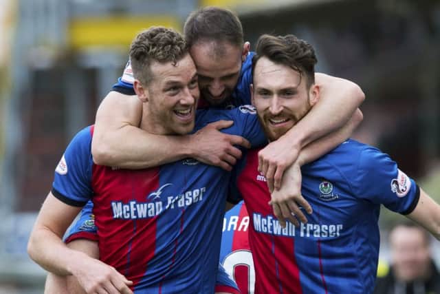 Joe Chalmers (right) celebrates his opening goal for Inverness with Sean Welsh (centre) and Jordan White. Picture: SNS