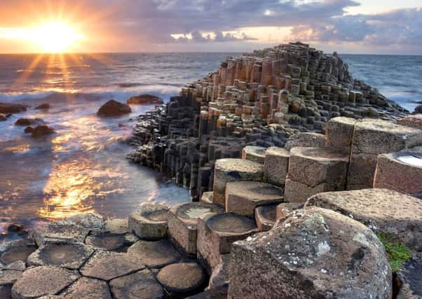 Sunset over the Giant's Causeway in North Antrim, the UNESCO world Heritage Site that attraced 1.7 million visitors last year