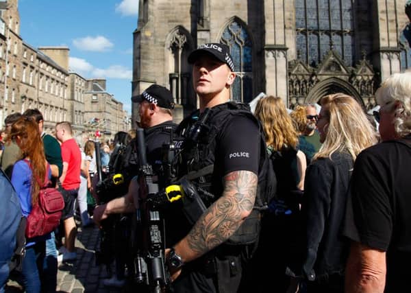 Armed Police on the High St during The Festival. Picture: JPIMedia