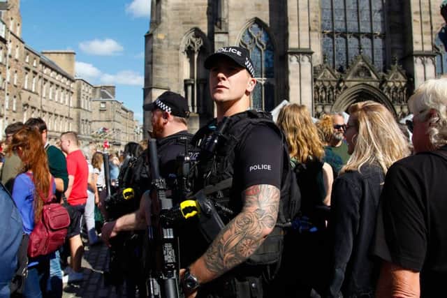 Armed Police on the High St during The Festival. Picture: JPIMedia