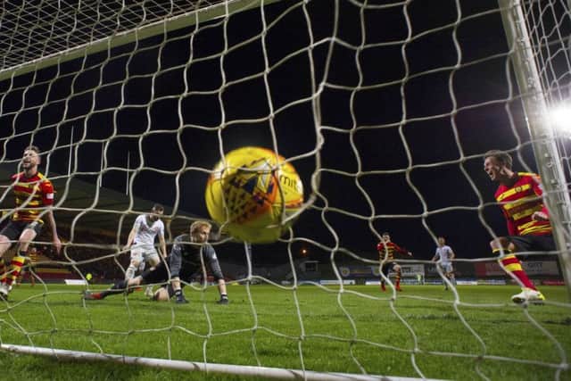 Christie Elliott's close-range effort nestles in the back of the net as Partick force a replay with Hearts. Picture: SNS Group