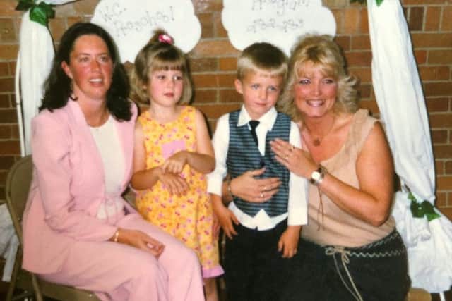 Emma and AJ in 2001 with their respective mothers. Picture: SWNS