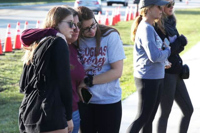 Students and relatives remember the victims of the mass shooting in Parkland. Picture: Joe Raedle/Getty Images