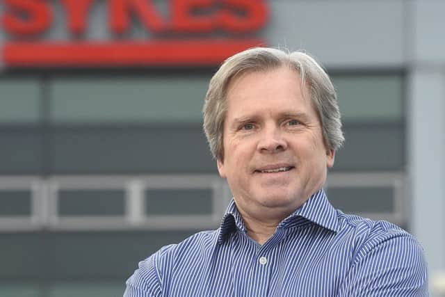Although Les Torrance works for an American multinational, he insists the company has retained its family feel. Picture: Greg Macvean