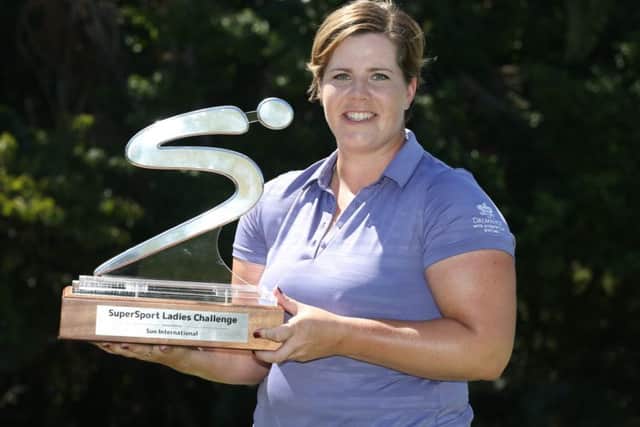 Jane Turner shows off the SuperSport Ladies Challenge trophy after her four-shot victory at Wild Coast Country Club. Picture: www.sunshineladiestour.com