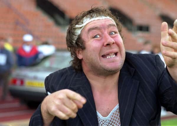 A picture of Scottish sporting prowess? Rab C Nesbitt prepares to talk part in a charity walk at Meadowbank stadium in Edinburgh in 1990 (Picture: Alan Ledgerwood)