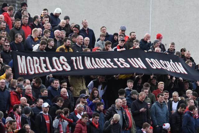 Aberdeen fans display a banner aimed at Alfredo Morelos. Picture: SNS Group
