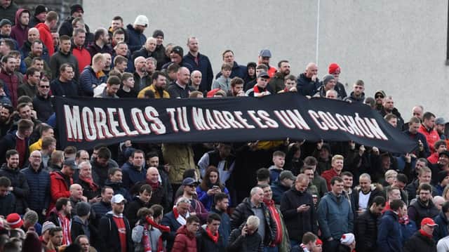 Aberdeen fans display a banner aimed at Alfredo Morelos. Picture: SNS Group