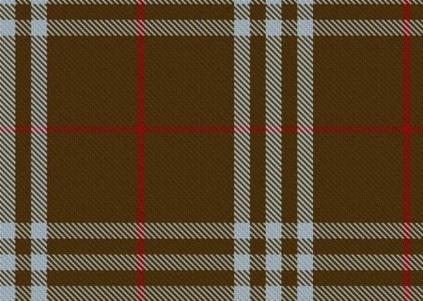 Reportedly designed by Janet Helm Presents Tartan - a Vancouver design company - for Coca Cola to use in a promotion.