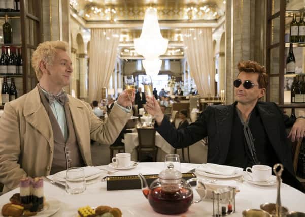 Michael Sheen as the Angel (left) and David Tennant as the Demon in Good Omens, based on the book by Terry Pratchett & Neil Gaiman. Picture: Amazon Prime Video/PA Wire