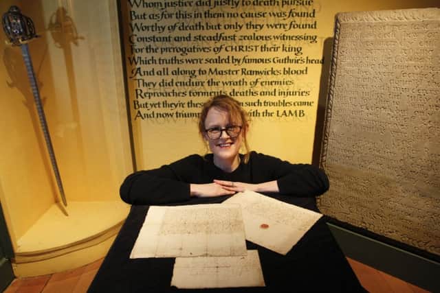 Vicky Garrington, curator at Museum of Edinburgh with Mary Queen of Scots original letters.