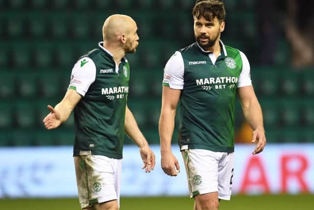 Seconds after the full-time whistle David Gray and Darren McGregor have already opened the inquest into Hibs defeat by Celtic. Picture: SNS.