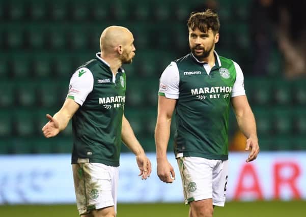 Seconds after the full-time whistle David Gray and Darren McGregor have already opened the inquest into Hibs defeat by Celtic. Picture: SNS.