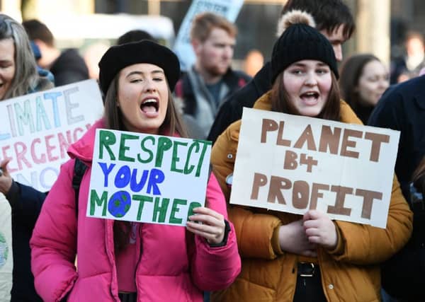School pupils protest in Glasgow's George Square. Picture: John Devlin