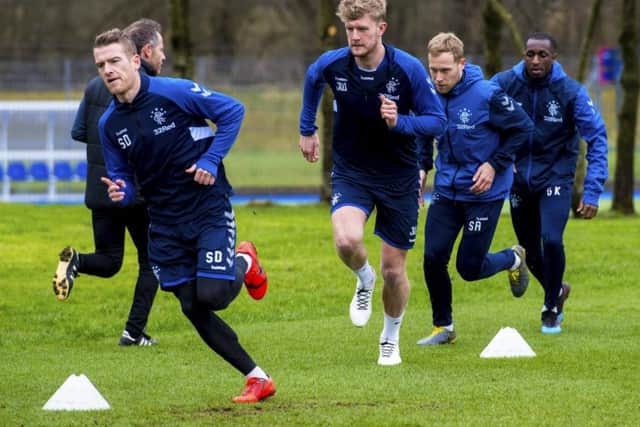 Rangers' Steven Davis trains with Joe Worrall, Scot Arfield and Glen Kamara. Picture: SNS
