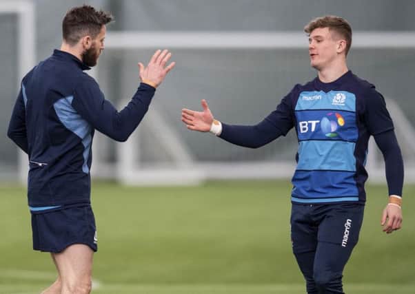 Tommy Seymour, left, and Darcy Graham share a handshake during training at Oriam. Picture: SNS/SRU