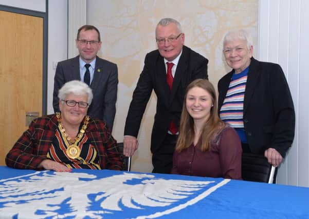 German student Stefanie Brand with North Lanarkshire provost Jean Jones and (standing l-r) planning manager Gordon Laing, council leader Jim Logue and Helen Russell of the Schwienfurt Twinning Association
