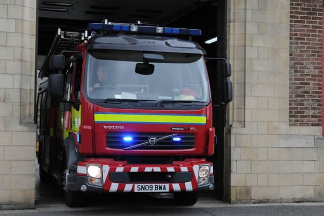 Firefighters have rescued two people from a Glasgow flat fire