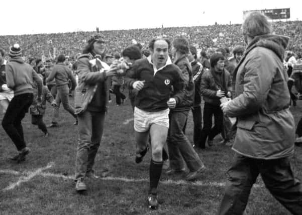 Jim Renwick is mobbed by Scotland supporters after a 15-6 win over Wales at Murrayfield in the 1981 Five Nations Championship. Picture: TSPL