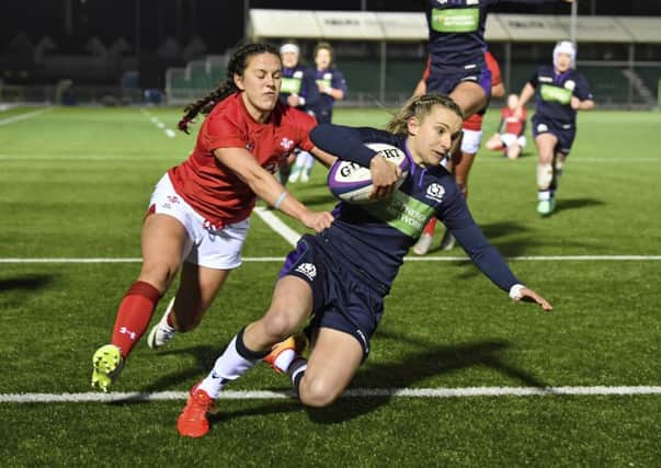 Scotland's Chloe Rollie goes over for her side's third try. Picture: SNS/SRU