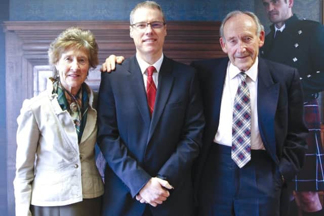 John Kinloch Anderson with mum and dad, Deirdre and Douglas